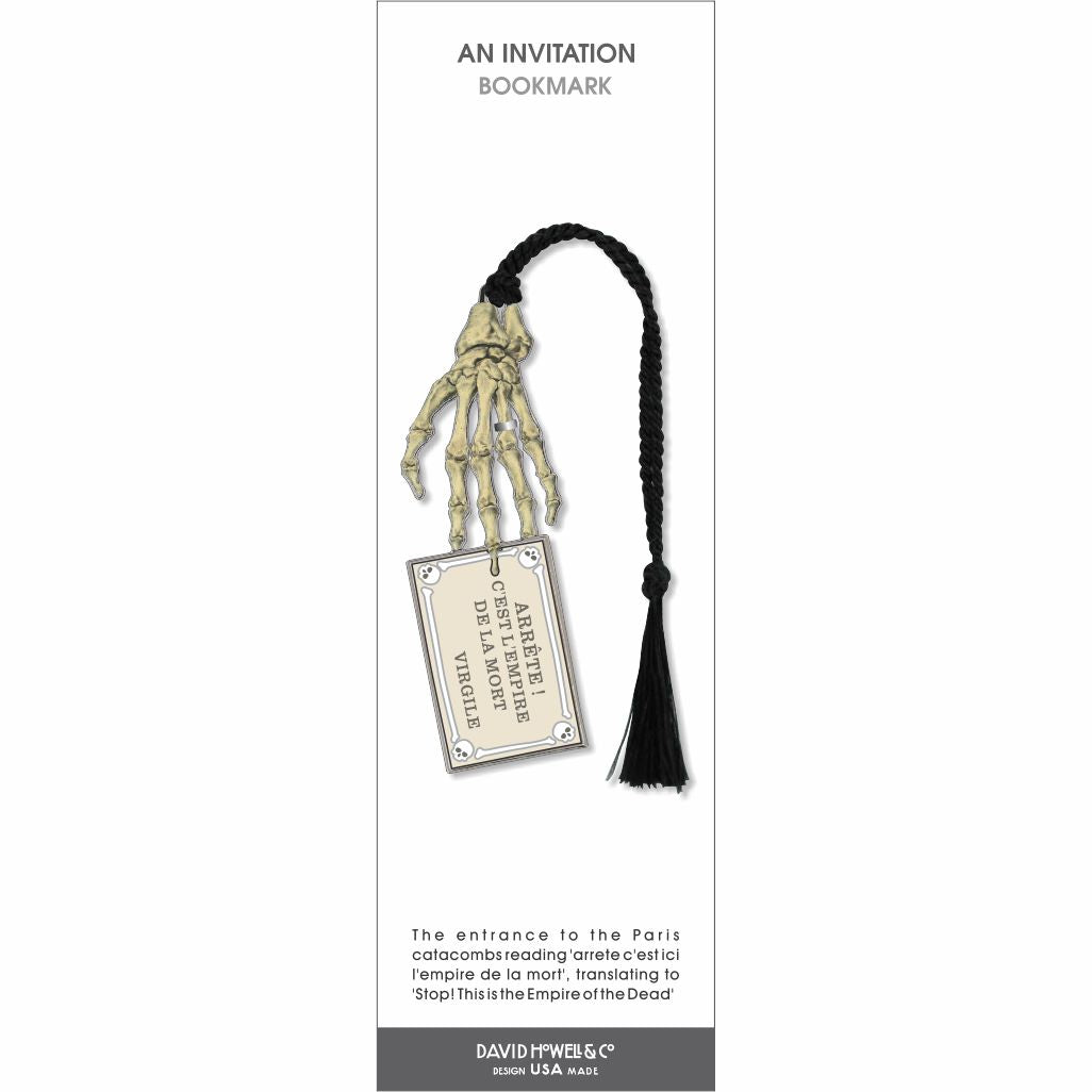 An Invitation bookmark featuring a skeletal hand holding a ticket, with black tassel.