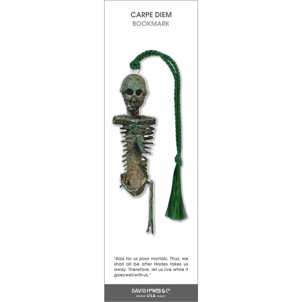Carpe Diem bookmark featuring a weathered skeleton figure with green patina finish and matching green tassel, symbolizing mortality.
