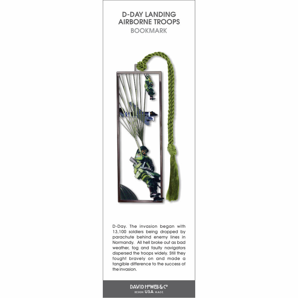 D-Day Airborne Troops’ bookmark showing a paratrooper descending by parachute with aircraft overhead and green tassel.