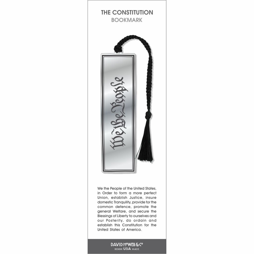 The Constitution’ bookmark featuring engraved script on a silver-toned design with a black braided tassel.