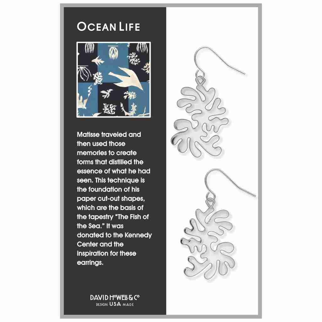 Ocean Life dangling earrings inspired by Matisse paper cut-out designs, featuring abstract silver-tone coral-shaped forms displayed on product packaging with ocean-themed artwork and description.