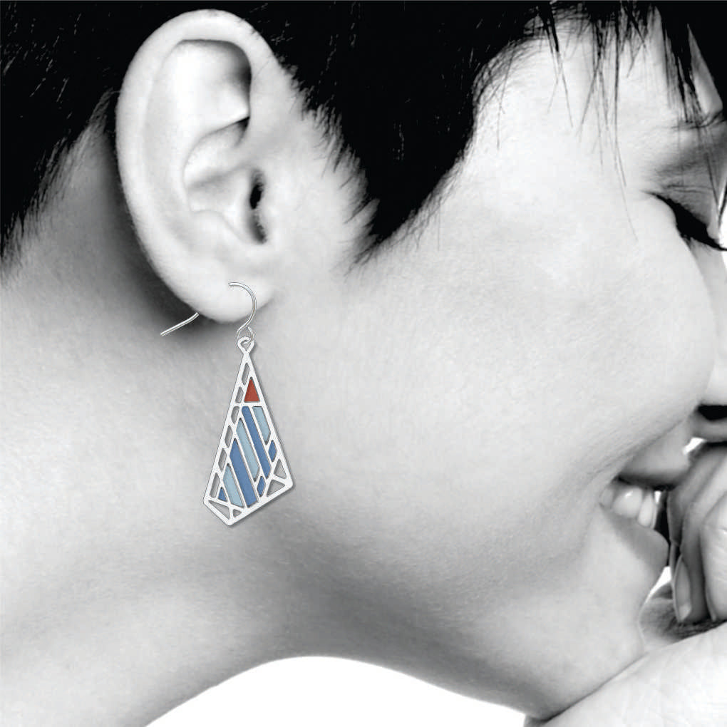 Dana-Thomas Butterfly Earrings, silver-tone geometric butterfly earrings with blue and red stained-glass-inspired accents shown on model