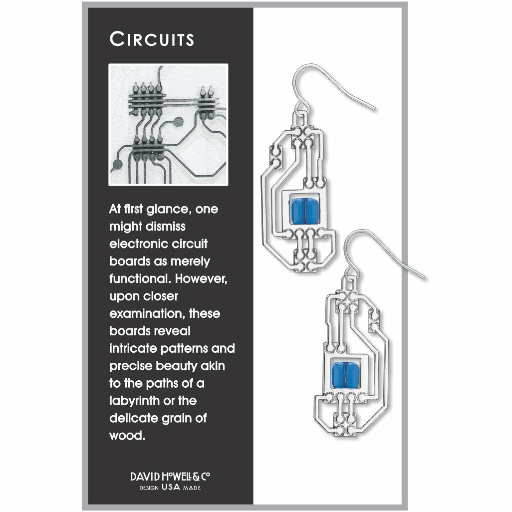 Pair of Circuits abstract silver drop earrings inspired by electronic circuit boards, featuring intricate openwork metal lines accented with vivid translucent blue geometric stones for a modern tech-inspired look