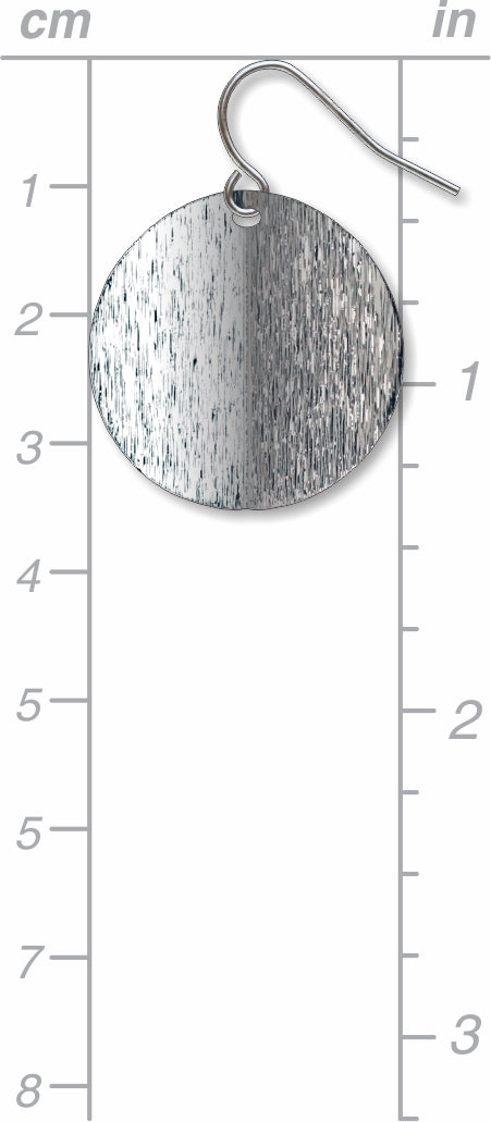 An Orb circular drop earring with a split-tone brushed silver finish, shown with size scale for reference and inspired by Ellsworth Kelly’s minimalist sculptural artwork