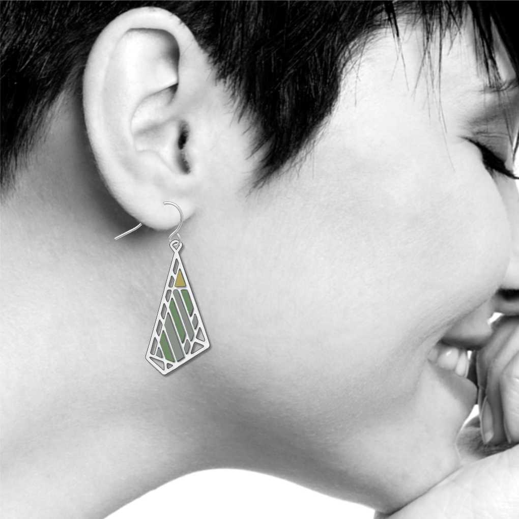 Dana-Thomas Butterfly Earrings, silver-tone geometric butterfly earring with sage green, olive green, and golden yellow accents shown on model