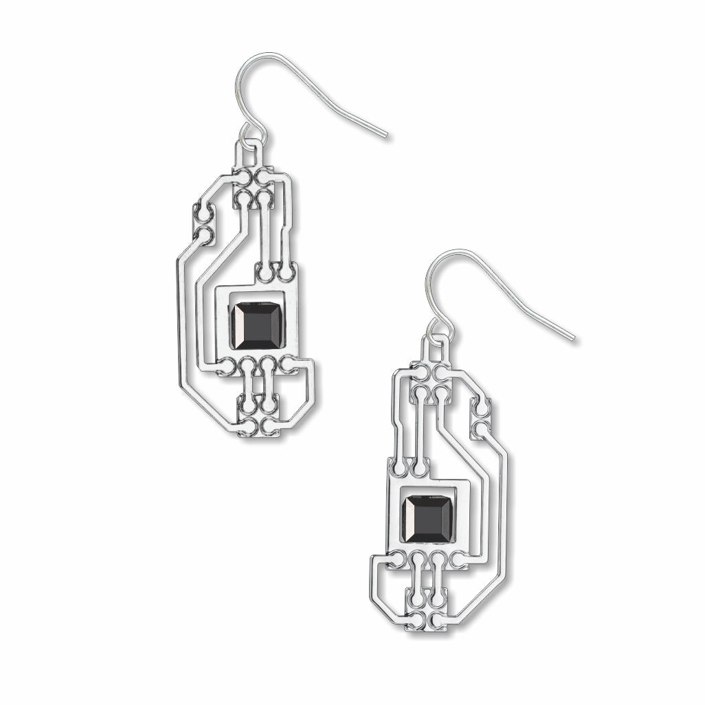 Pair of Circuits abstract silver drop earrings featuring intricate circuit board-inspired openwork lines accented with faceted black geometric stones in a sleek modern industrial design