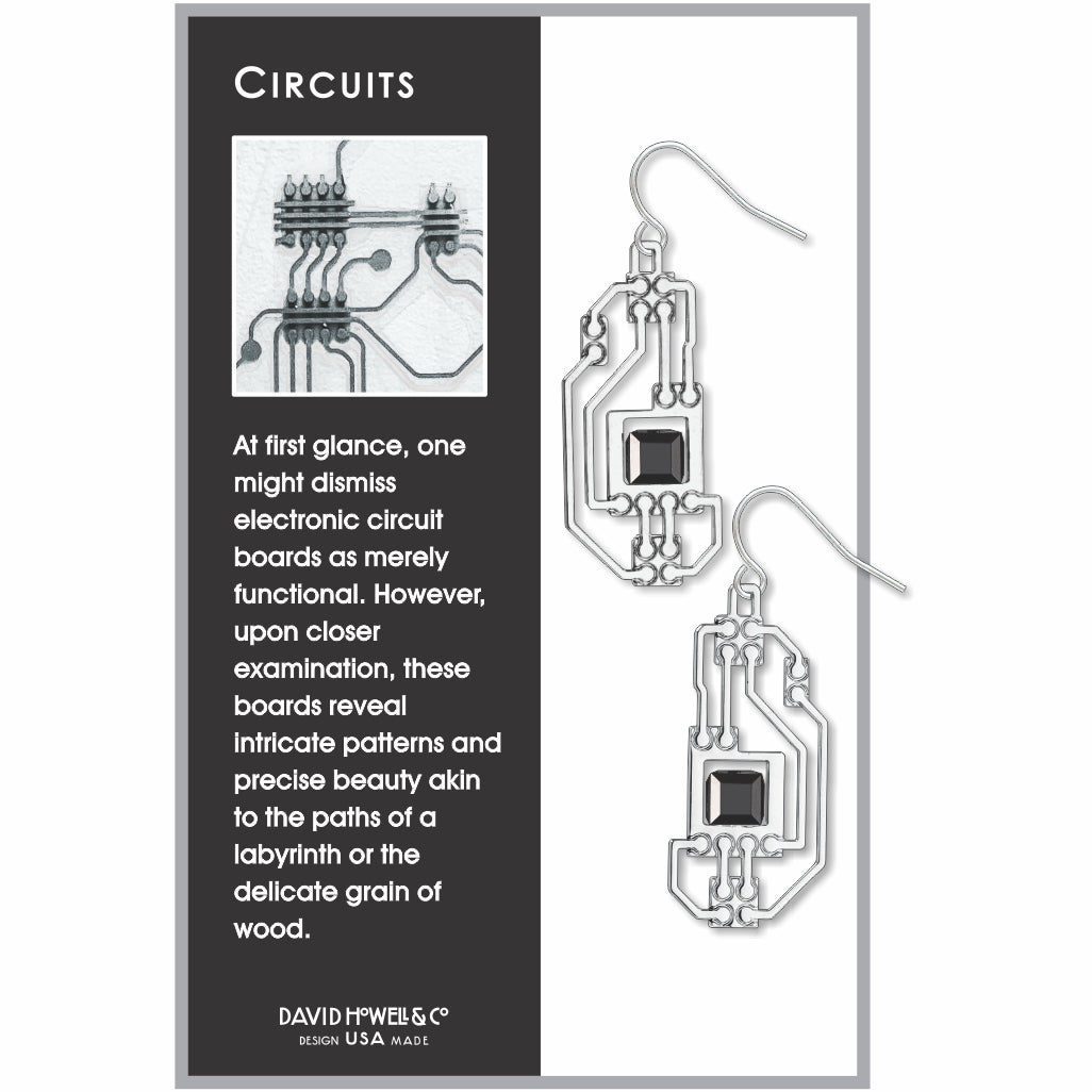 Circuits abstract silver drop earrings with intricate circuit board-inspired lines and faceted black geometric accents influenced by electronic circuitry patterns