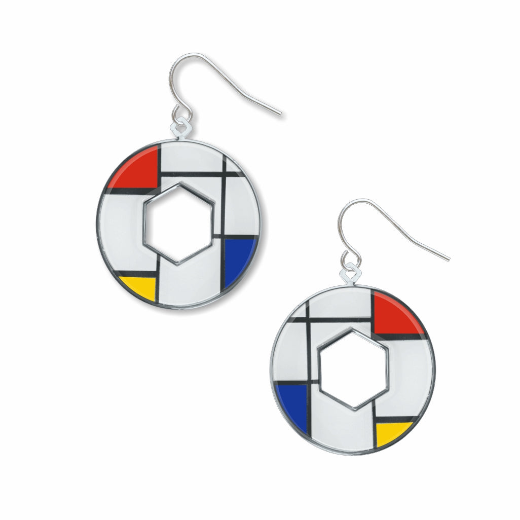 Utopia geometric dangle earrings inspired by Mondrian artwork, featuring circular silver-tone shapes with red, blue, yellow, black, and white enamel accents.