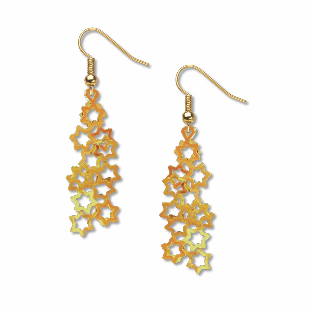 Star Clusters dangling earrings featuring cascading gold-tone open star shapes layered together to create a celestial-inspired design with fishhook ear wires.