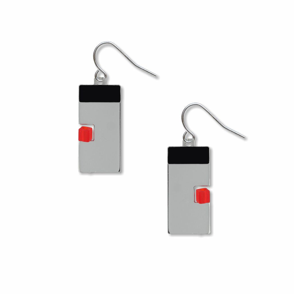 Pair of balance earrings featuring geometric silver rectangles with black tops and red accent blocks, finished with hook backings.
