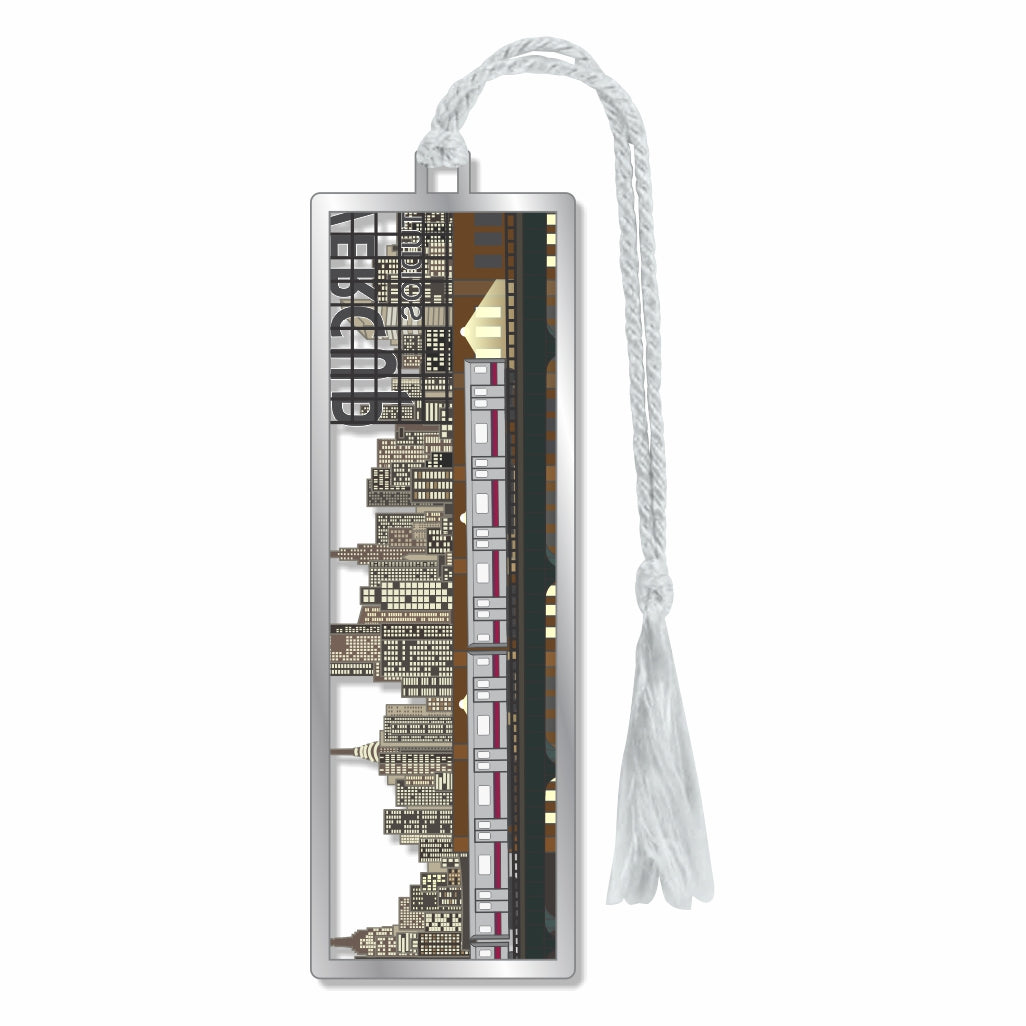 A metal bookmark featuring a detailed architecture of the Manhattan skyline and train, with silver braided tassel for museum-quality gift for art lovers, train enthusiasts, museum goers and readers.