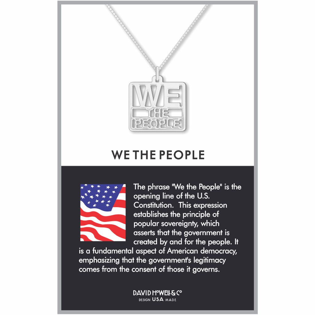 We the People necklace displayed on packaging with a silver-tone square pendant featuring cutout lettering on a delicate chain, inspired by the opening words of the U.S. Constitution.
