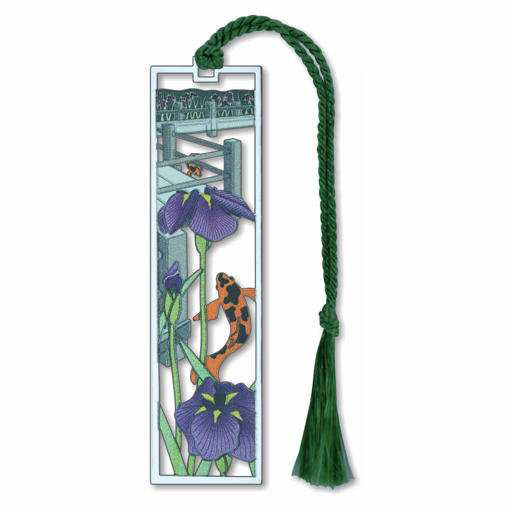 A metal bookmark featuring a zig zag bridge, koi fish, and Siberian iris designs, with a green tassel.