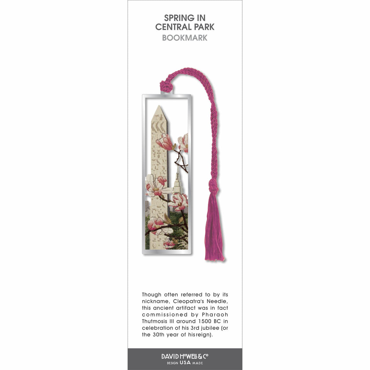 Spring in Central Park’ bookmark featuring cherry blossoms and city monument scene, with a pink braided tassel.