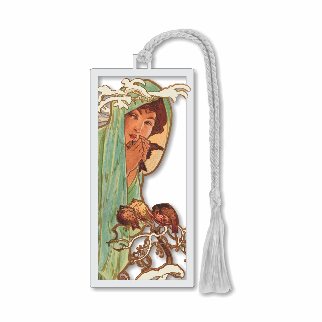 Metal bookmark featuring Alphonse Mucha’s Winter from The Four Seasons series, depicting a graceful young woman in a pale green cloak protecting birds beside a snow-covered bush in elegant Art Nouveau style with silver braided tassel for a museum-quality gift for art lovers, museum goers, and readers.