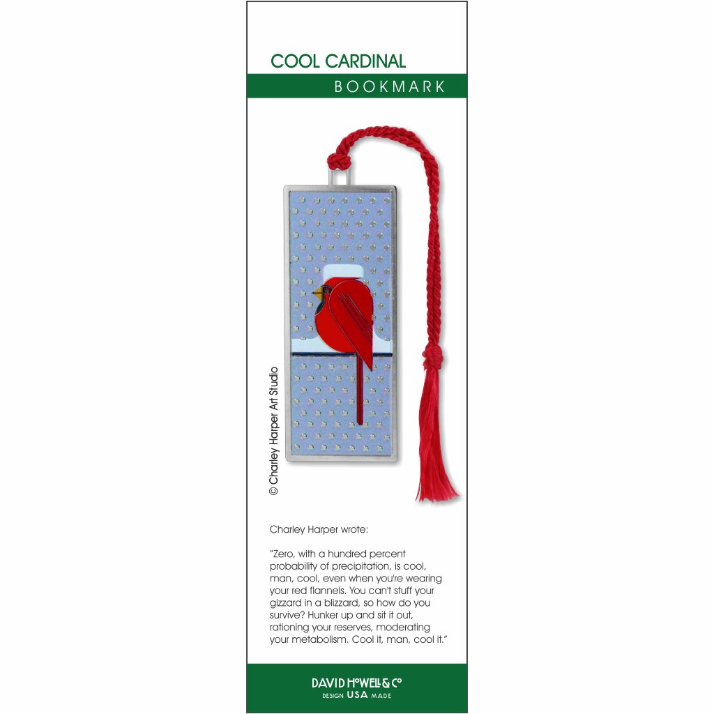 A metal bookmark with a red cardinal bird design with snow on his head attached to a red tassel.