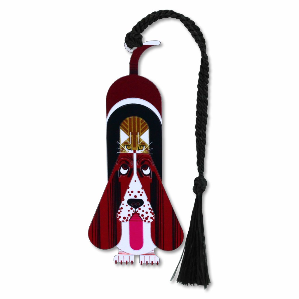 A metal Charley Harper bookmark featuring an artistic depiction of a dog and a cat with a braided black tassel.