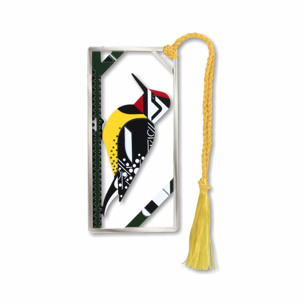 A metal Charley Harper bookmark featuring an illustration of a bird with a yellow-bellied sapsucker on a sycamore tree in a silver frame attached to a golden tassel.