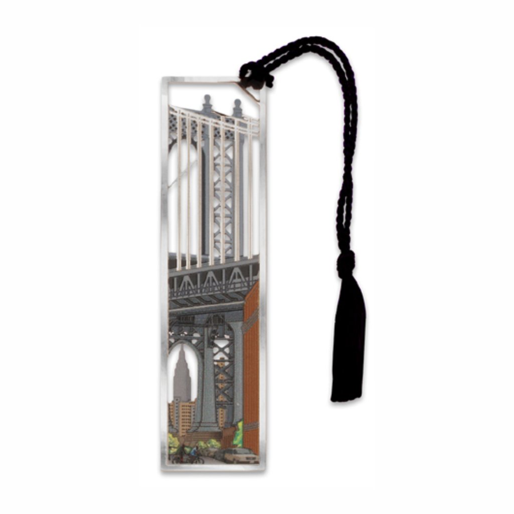 A metal bookmark with a 3D print of the Manhattan Dumbo Bridge with skyline and Empire State Building with a black tassel.