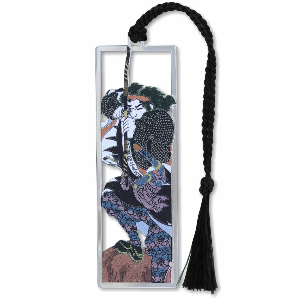Faithful Samurai metal bookmark featuring imagery inspired by The Treasury of Loyal Retainers, a classic tale of loyalty and revenge in Japanese history. The design is based on a woodblock print by Utagawa Kuniyoshi, depicting the retainer Mase Chudayu Masaaki drawing his bow to fire an arrow. Known as a skilled swordsman even at age 62, Mase is shown in a moment of focused action that reflects bravery, discipline, and unwavering loyalty among his companions with a black braided tassel.
