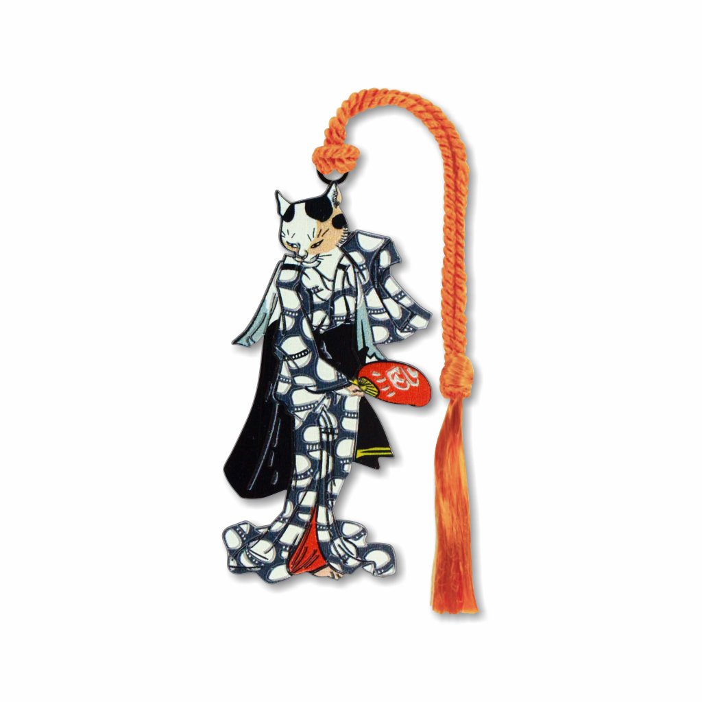 A metal bookmark in the shape of an anthropomorphized cat wearing a kimono, and holding a fan with a orange braided tassel.