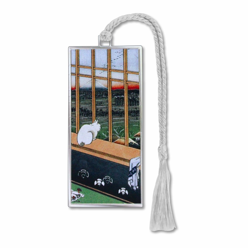 Metal bookmark inspired by Utagawa Hiroshige’s woodblock print featuring a solitary cat in rice fields with Mt. Fuji in the distance, a soft dawn sky, and minimalist Edo-period landscape details with silver braided tassel.