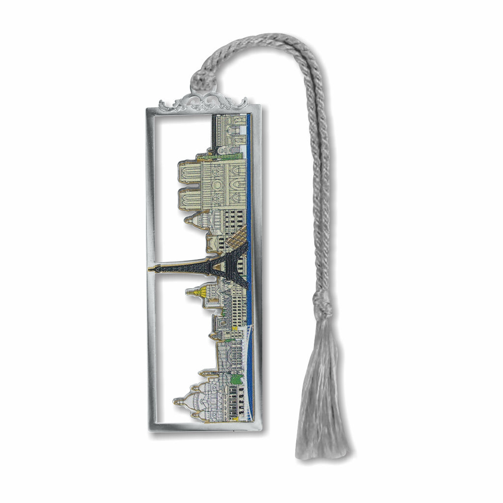 Paris Skyline metal bookmark featuring a stylized silhouette of iconic Paris landmarks including the Eiffel Tower and Louvre Pyramid with gray braided tassel.