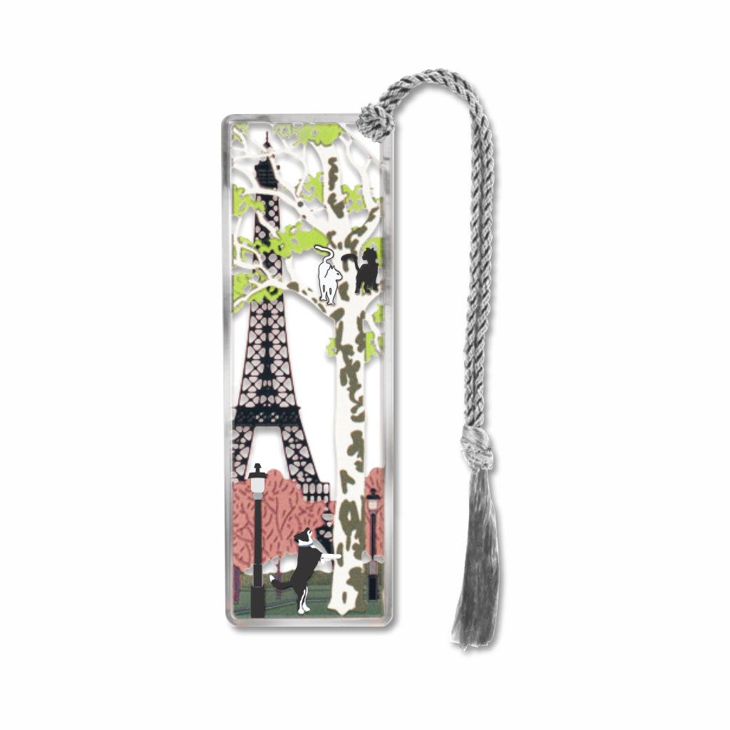 Spring in Paris Eiffel Tower metal bookmark featuring a view of the Eiffel Tower from the Champ de Mars, Paris with a dog and two cats playing. Complete with silver braided tassel.