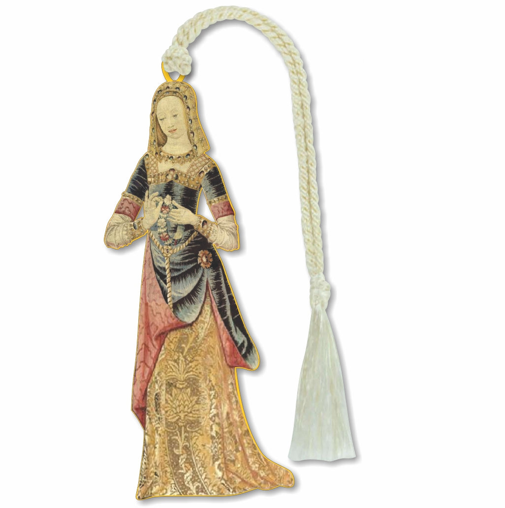 A brass bookmark in the shape of a medieval tapestry depiction of a lady, with amaidservant and a basket of flowers, framed by a lion and unicorn, with a tassel.