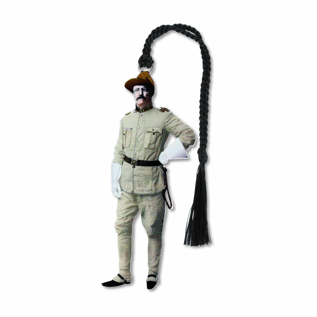 A metal bookmark featuring an illustration of Theodore Roosevelt in a military uniform, with a mustache and a hat and braided black tassel.