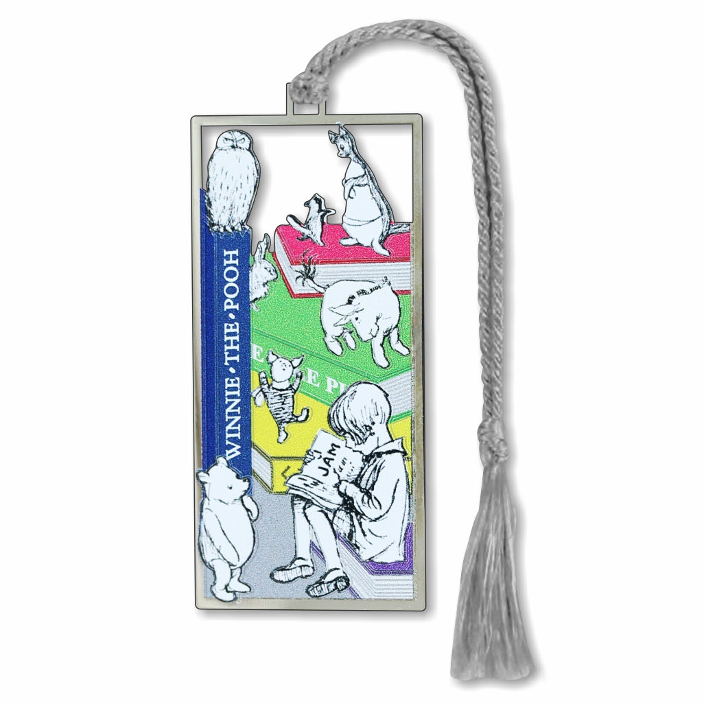 A metal bookmark featuring an illustration of Winnie-the-Pooh characters with a braided silver tassel.