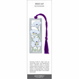 Sego Lily bookmark with white flowers, green stems, and a purple tassel.