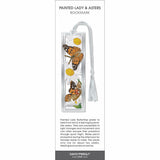 Painted Lady & Asters bookmark featuring orange butterflies on white aster flowers, silver frame, and white tassel.
