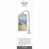 Path in the Wheat Fields Monet bookmark, coastal path through fields leading to sea, soft sky, silver frame, white tassel