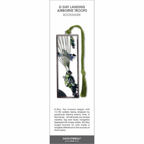 D-Day Airborne Troops’ bookmark showing a paratrooper descending by parachute with aircraft overhead and green tassel.