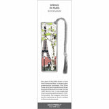 Spring in Paris’ bookmark featuring the Eiffel Tower, a dog in the park, and cats in a tree, with a gray tassel.