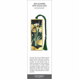 Iris flowers bookmark with gold leaf accents, green stems, dark background, and a green tassel.