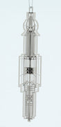 Decorative silver metal Frank Lloyd Wright Chauncey Williams Keepsake with a complex geometric design. 