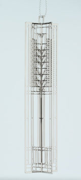 Frank Lloyd Wright Tree of Life silver metal keepsake based on a window design.
