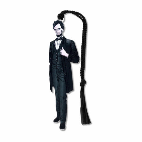 A metal bookmark shaped like Abraham Lincoln with a black tassel, featuring an illustration of Lincoln in his presidential attire.