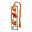A silver metal bookmark with a depiction of orange California poppies and an orange tassel.