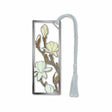 A metal bookmark with a magnolia flower design, electro-plated with non-tarnishing silver finish, attached to a silver tassel.