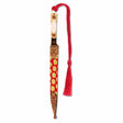 A decorative metal bookmark designed to resemble a Mughal dagger with a gold finish, floral patterns, and a red tassel.