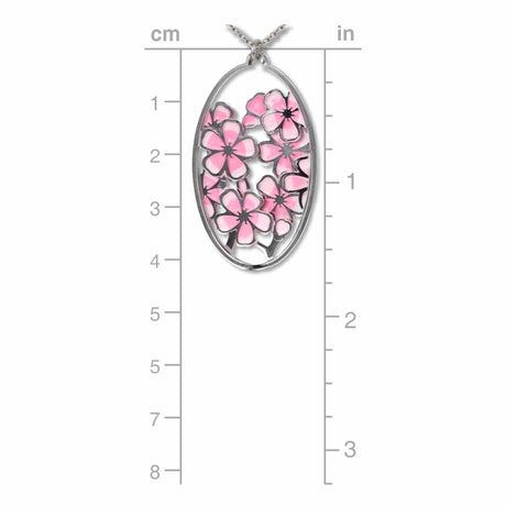 Hiroshige Cherry Blossom pendant necklace shown on a measurement chart, featuring an oval silver-tone pendant with layered pink cherry blossom flowers and openwork detailing.