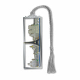 Paris Skyline metal bookmark featuring a stylized silhouette of iconic Paris landmarks including the Eiffel Tower and Louvre Pyramid with gray braided tassel.