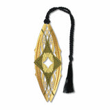 A Louis Sullivan brass prairie school bookmark with a Art Deco geometric and organic pattern, attached to a braided black tassel.