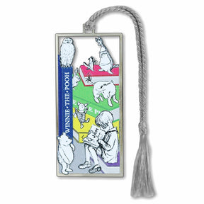 A metal bookmark featuring an illustration of Winnie-the-Pooh characters with a braided silver tassel.